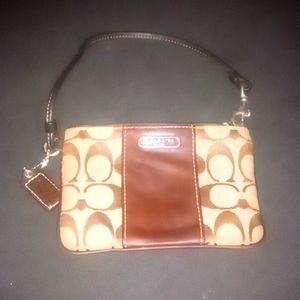 Brown coach wristlet